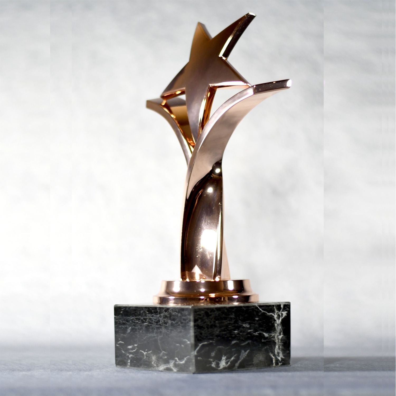 Twisting Star On Black Marble Base, Gold, Silver, Bronze | Global Recognition Inc