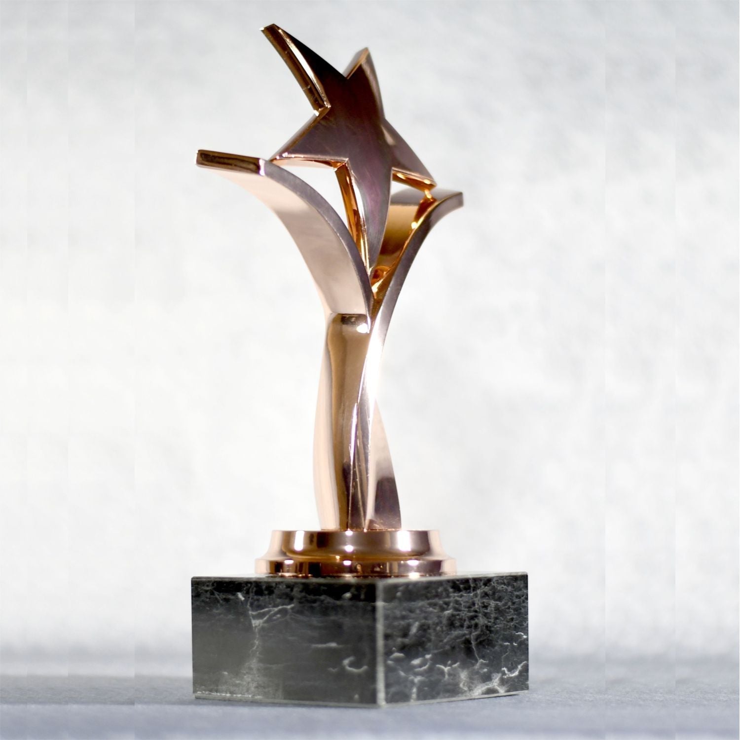 Twisting Star On Black Marble Base, Gold, Silver, Bronze | Global Recognition Inc