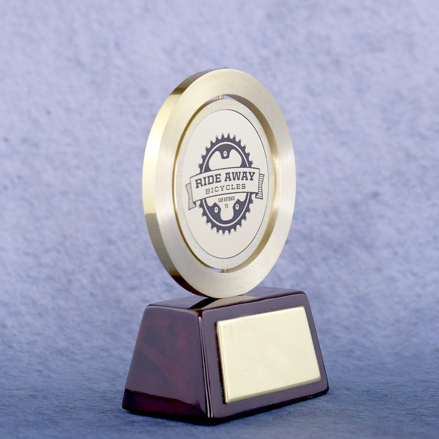 Gold Spinning Medal On Rosewood Base | Global Recognition Inc