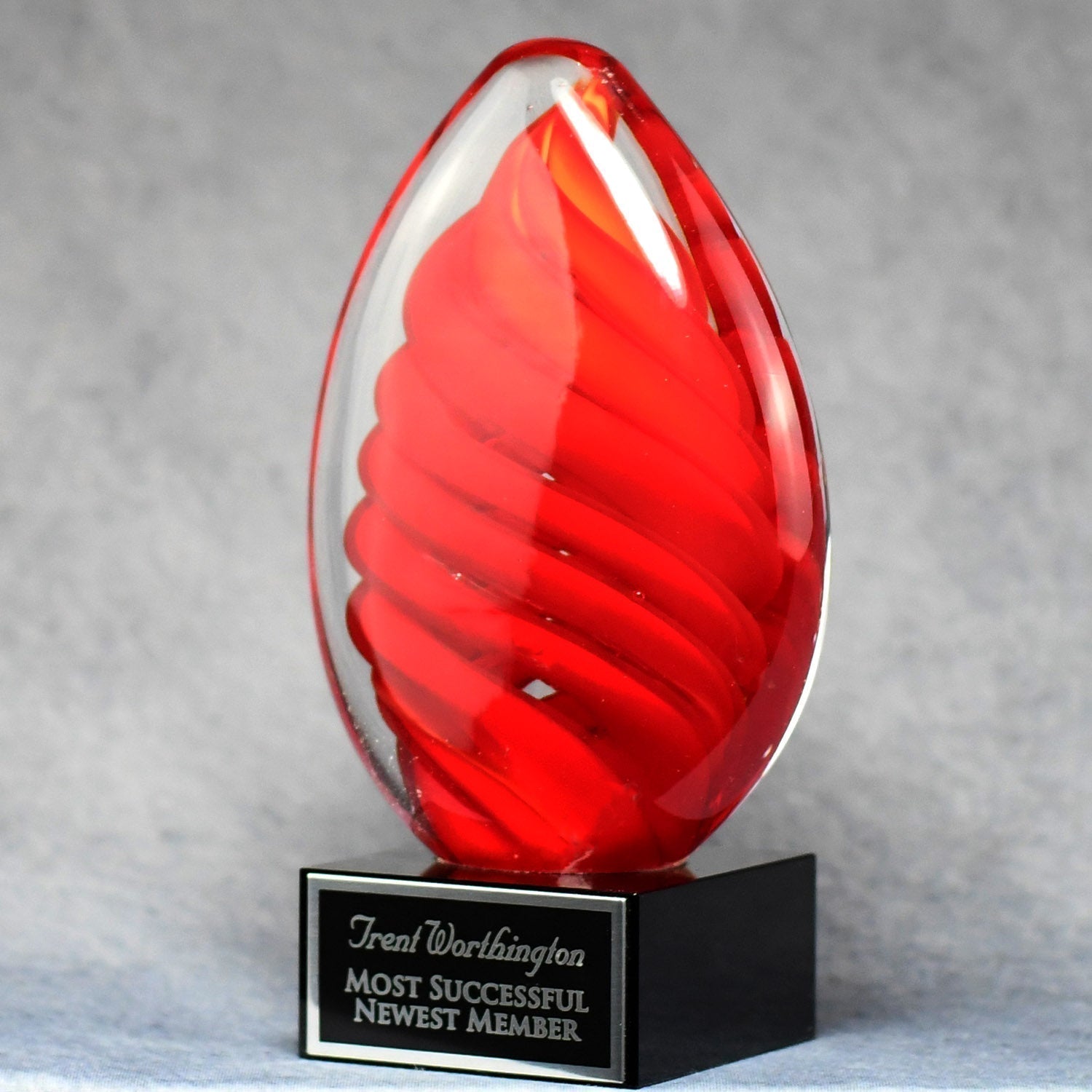 Red Swirl Egg On Black Glass Base | Global Recognition Inc