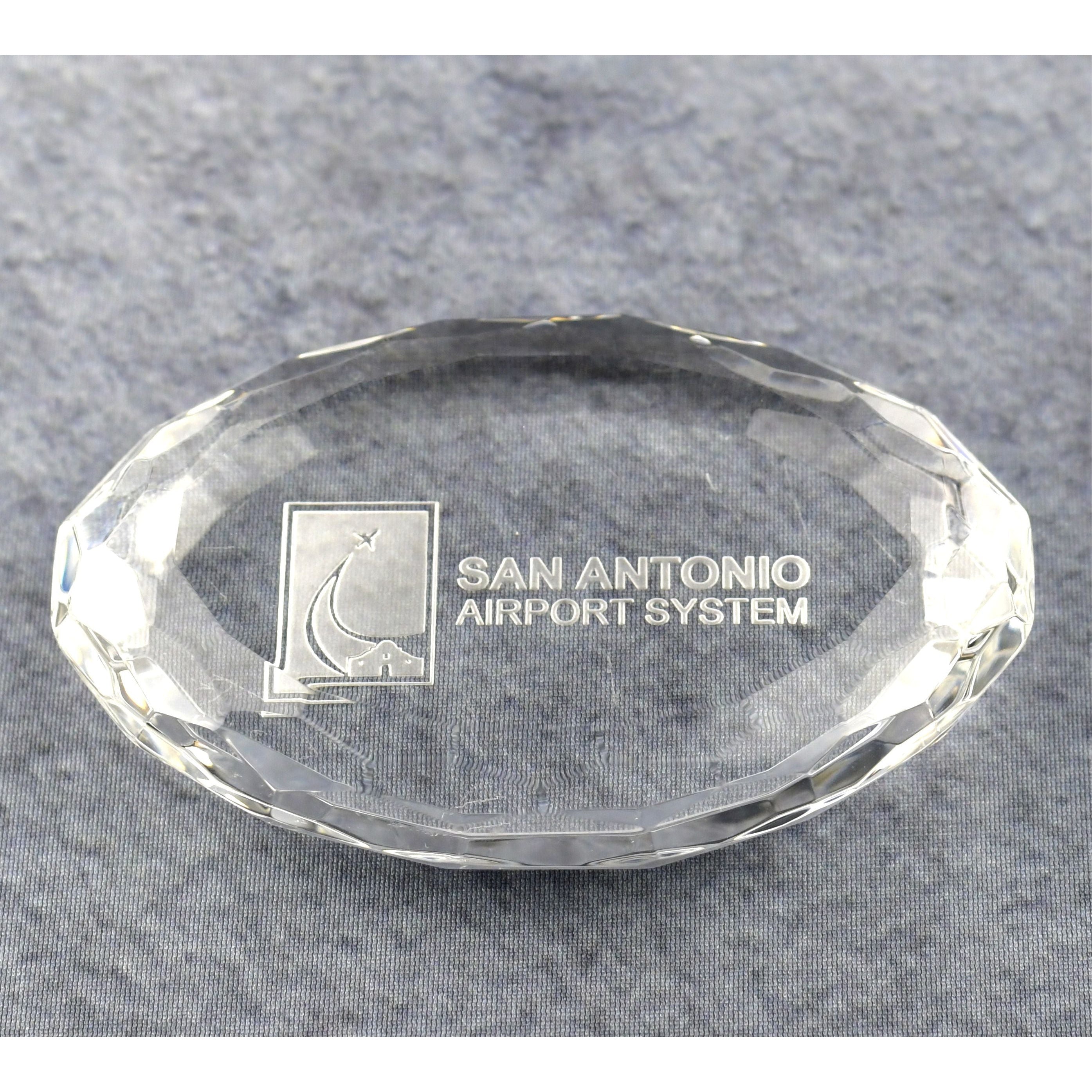 Crystal Oval Multi-Faceted Paperweight | Global Recognition Inc