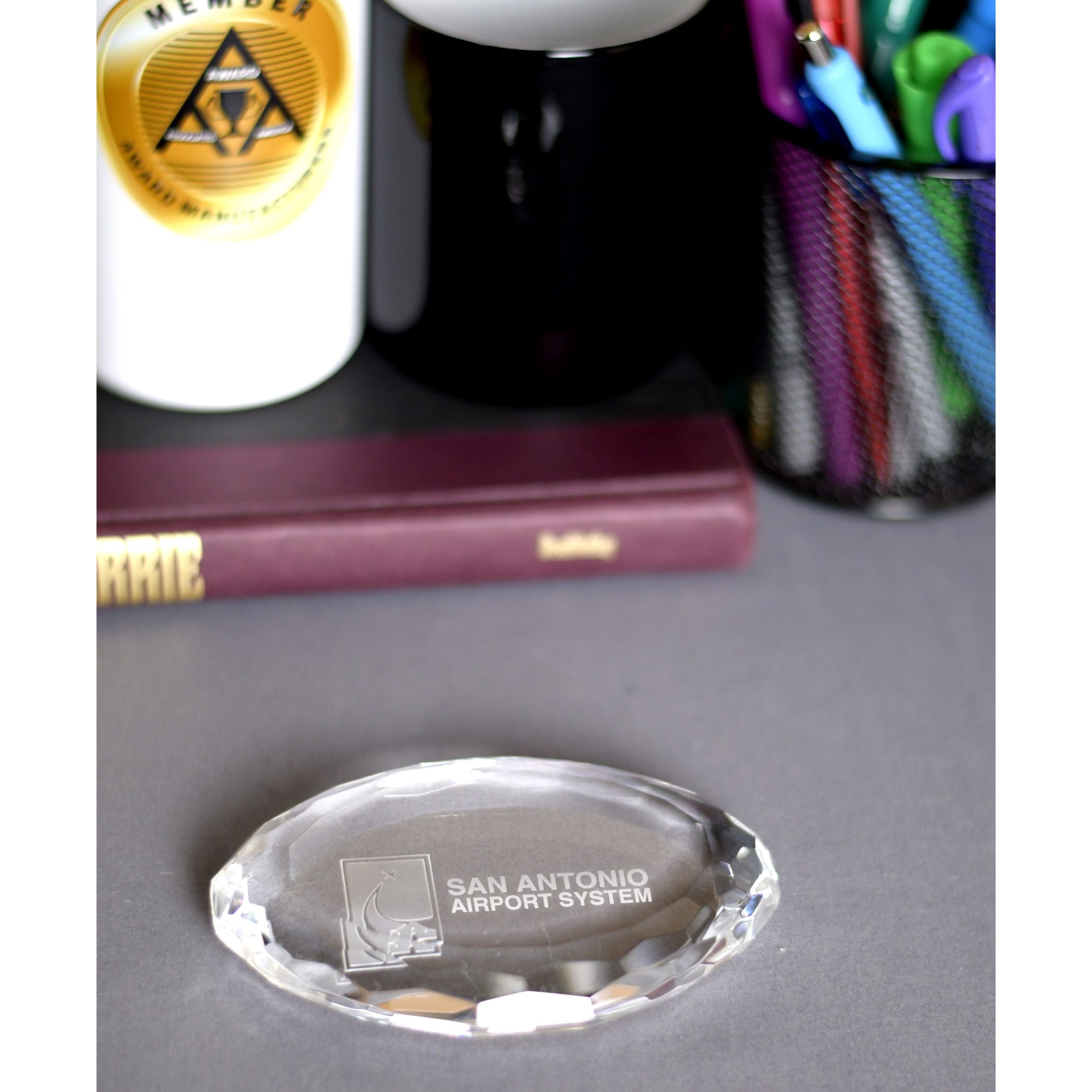 Crystal Oval Multi-Faceted Paperweight | Global Recognition Inc