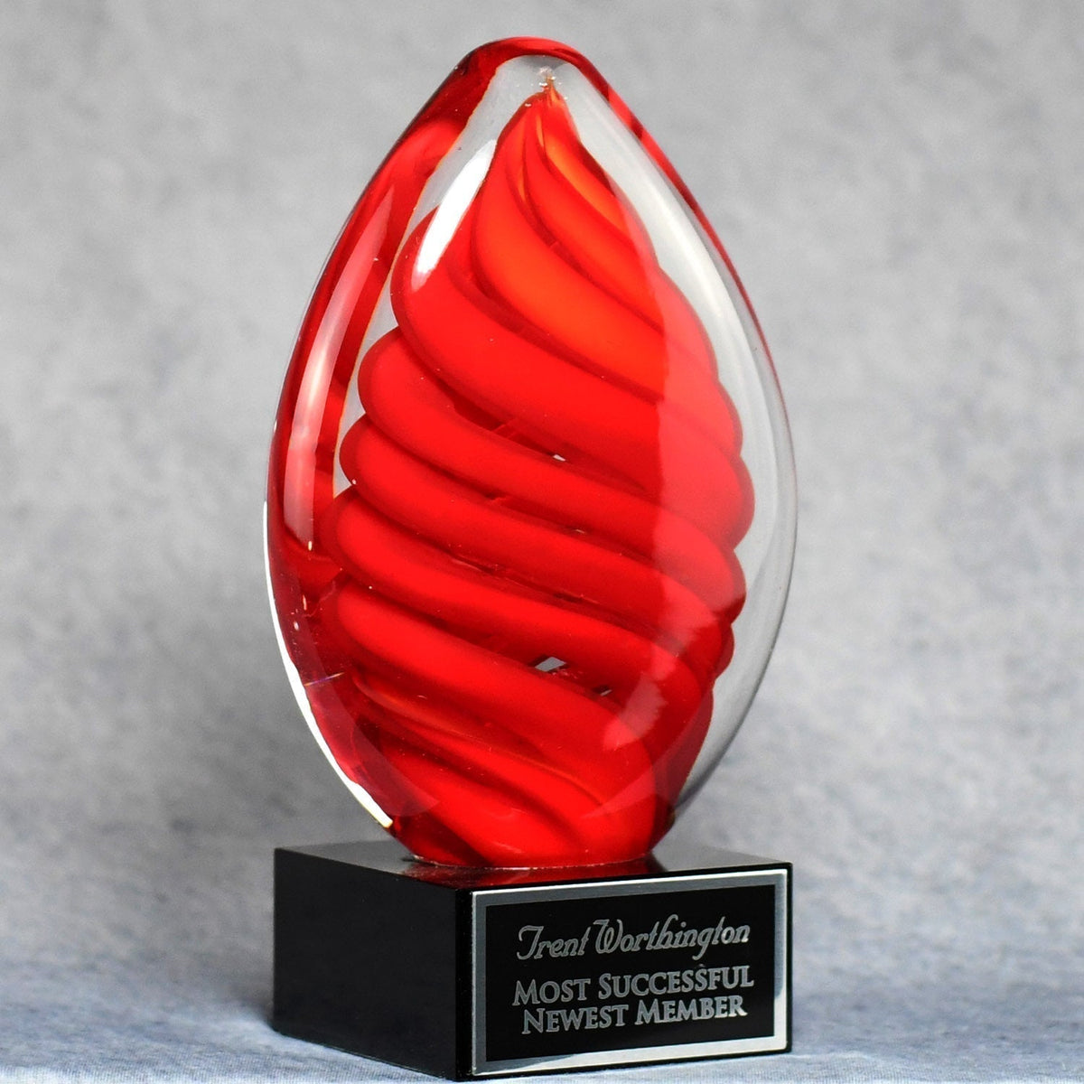 Red Swirl Egg On Black Glass Base | Global Recognition Inc